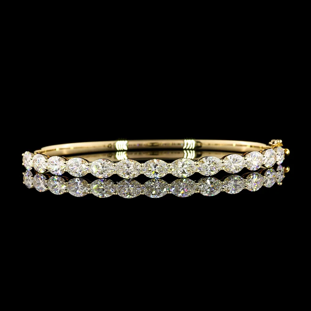 14K Yellow Gold East-West Bangle Bracelet with 13 Oval Cut Lab Diamonds - 5.64 Carats Total Diamond Weight - Covaloro Fine Jewelry