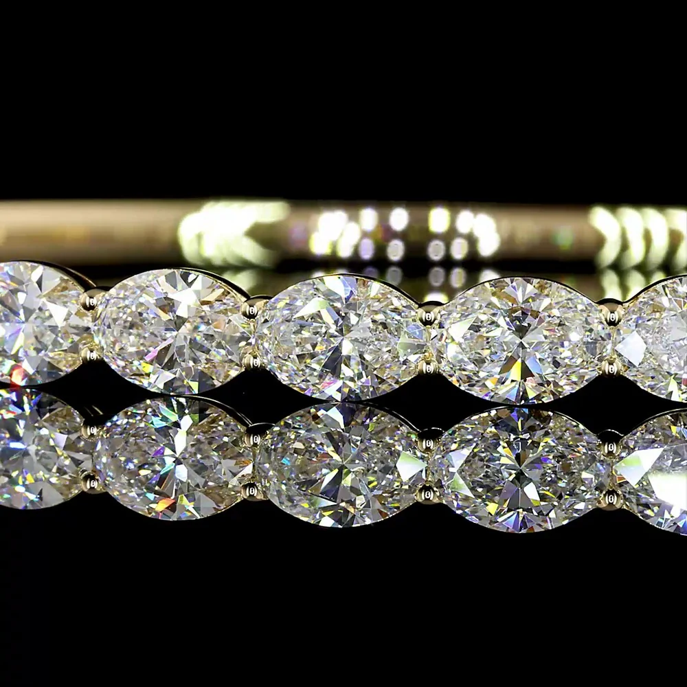 14K Yellow Gold East-West Bangle Bracelet with 13 Oval Cut Lab Diamonds - 5.64 Carats Total Diamond Weight - Covaloro Fine Jewelry - Image 2