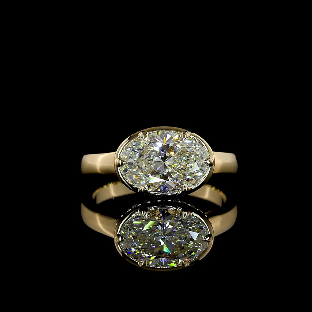 14K Yellow Gold East-West Hidden Halo Ring with 2.13 Carat Oval Cut Lab Diamond and 0.12 Carat Brilliant Cut Accent Diamonds - 2.25 Carat Total Weight - Covaloro Fine Jewelry