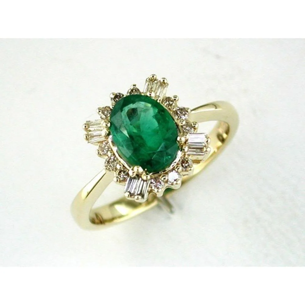 14K Yellow Gold Emerald & Diamond Halo Ring with Oval Emerald - 1.20 Carats Emerald, 0.25 Carats Total Diamond Weight - Royal Jewelry