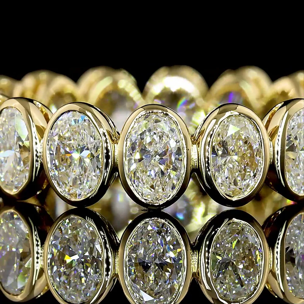 14K Yellow Gold Eternity Band with 16 Bezel-Set Oval Lab Diamonds - 3.03 Total Carat Weight, E-F Color VS Clarity, North-South Orientation - Covaloro Fine Jewelry - Image 2