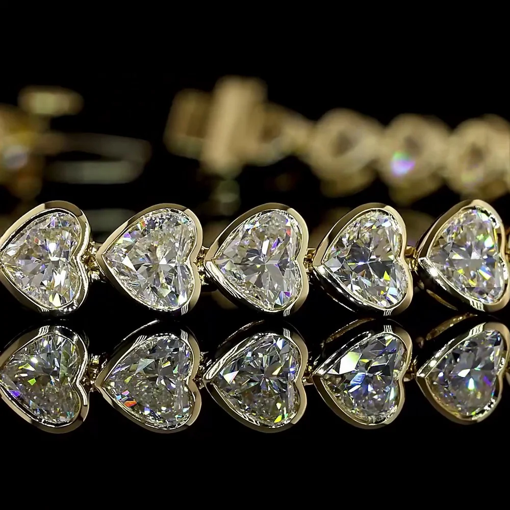 14K Yellow Gold Heart Shape Tennis Bracelet with East-West Bezel Set Lab Diamonds - 10.37 Carats Total Diamond Weight - Covaloro Fine Jewelry - Image 2