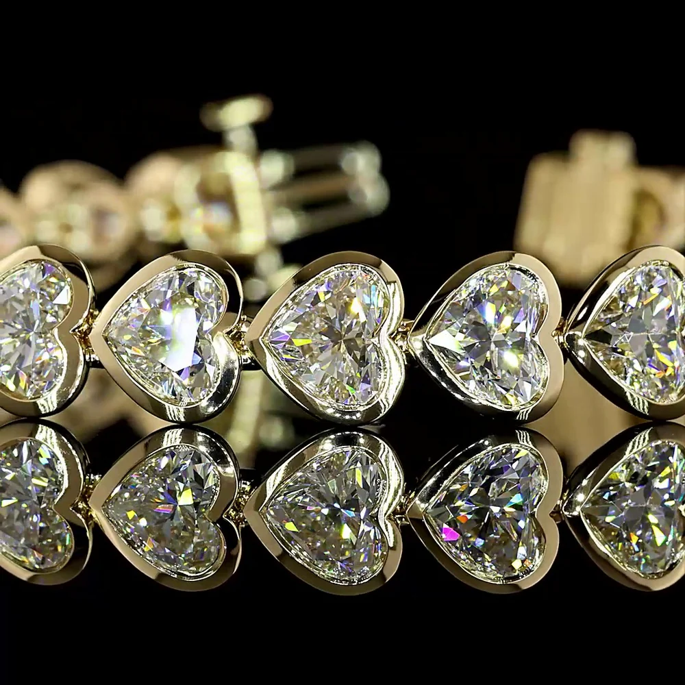 14K Yellow Gold Heart-Shaped Lab Diamond Tennis Bracelet with Bezel Setting - 15.90 Carat Total Weight, 28 Stones, E-F VS1 - Covaloro Fine Jewelry - Image 2