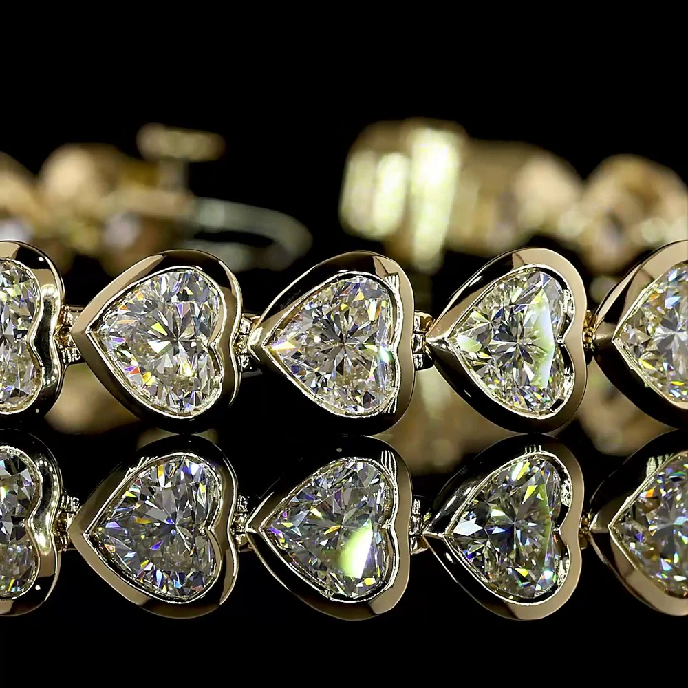 14K Yellow Gold Heart Shaped Lab Diamond Tennis Bracelet with East-West Bezel Setting - 13.04 Carat Total Weight - Covaloro Fine Jewelry - Image 2