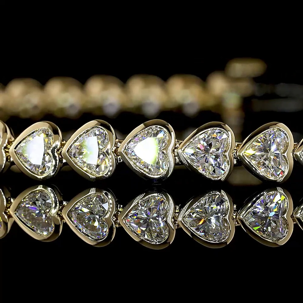 14K Yellow Gold Heart-Shaped Tennis Bracelet with East-West Bezel Set Lab Diamonds - 5.46 Carat Total Diamond Weight - Covaloro Fine Jewelry - Image 2