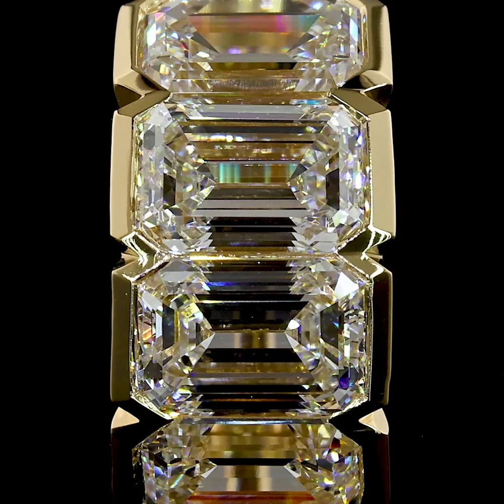 14K Yellow Gold Huggie Earrings with Half-Bezel Set Emerald Cut Lab Diamonds - 4.14 Carat Total Weight - Covaloro Fine Jewelry - Image 3
