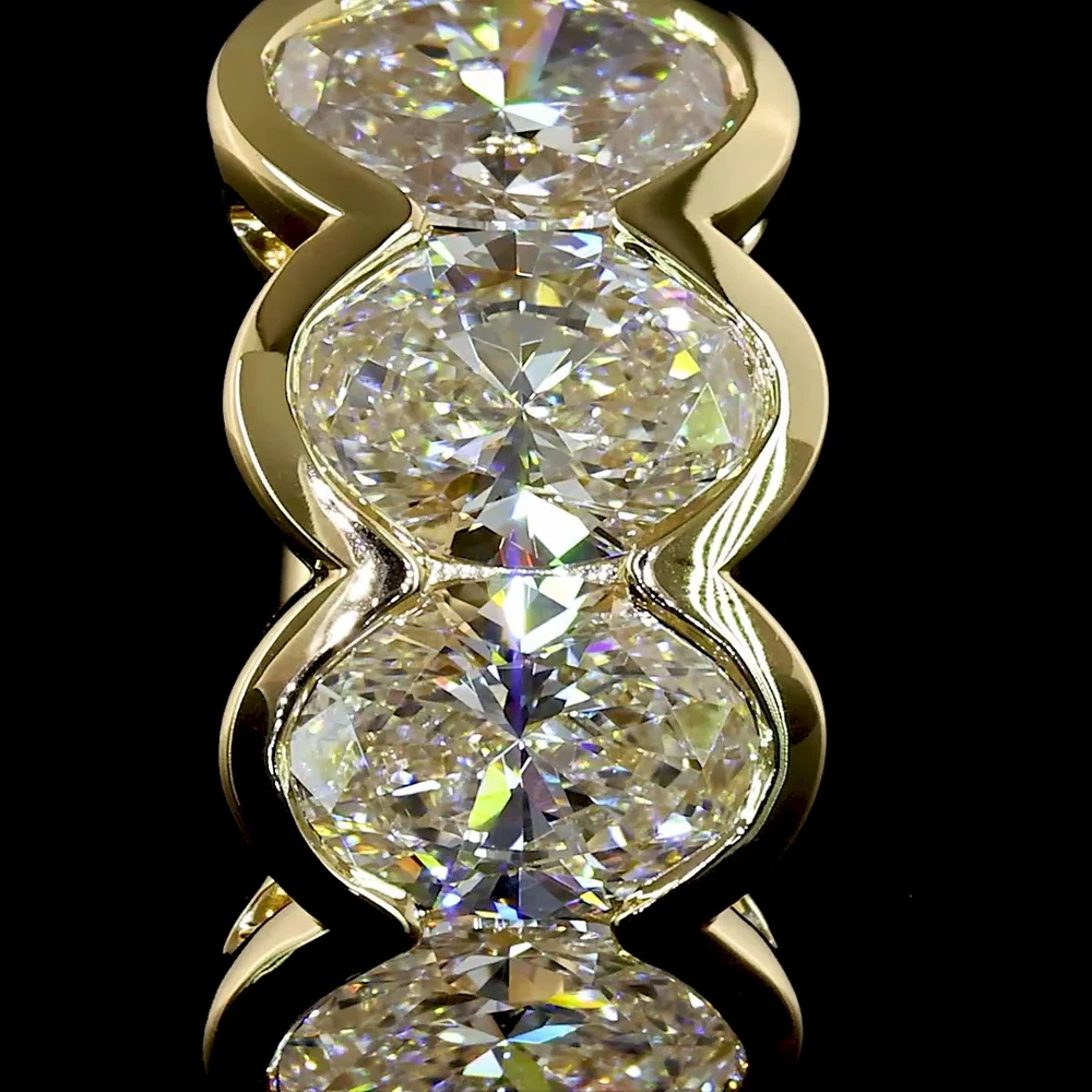14K Yellow Gold Huggie Earrings with Half Bezel Set Oval Cut Lab Diamonds - 2.09 Carat Total Weight - Covaloro Fine Jewelry - Image 3