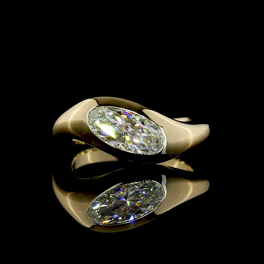 14K Yellow Gold Inclined Flush Set Solitaire Ring with 1.09 Carat Moval Cut Lab Diamond - E-F Color VVS2 Clarity - Covaloro Fine Jewelry