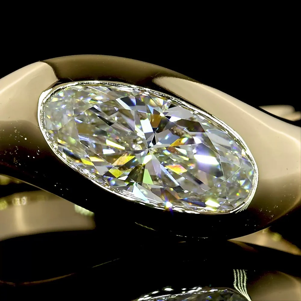 14K Yellow Gold Inclined Flush Set Solitaire Ring with 1.09 Carat Moval Cut Lab Diamond - E-F Color VVS2 Clarity - Covaloro Fine Jewelry - Image 2