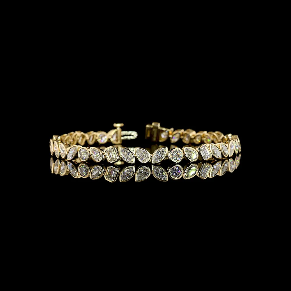 14K Yellow Gold Mixed Shape Tennis Bracelet with Bezel Set Lab Diamonds featuring Emerald, Pear, Marquise, and Round Cuts - 8.13 Carat Total Diamond Weight - Covaloro Fine Jewelry