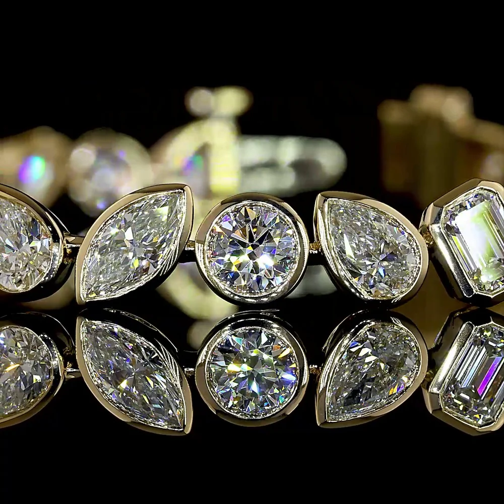 14K Yellow Gold Mixed Shape Tennis Bracelet with Bezel Set Lab Diamonds featuring Emerald, Pear, Marquise, and Round Cuts - 8.13 Carat Total Diamond Weight - Covaloro Fine Jewelry - Image 2