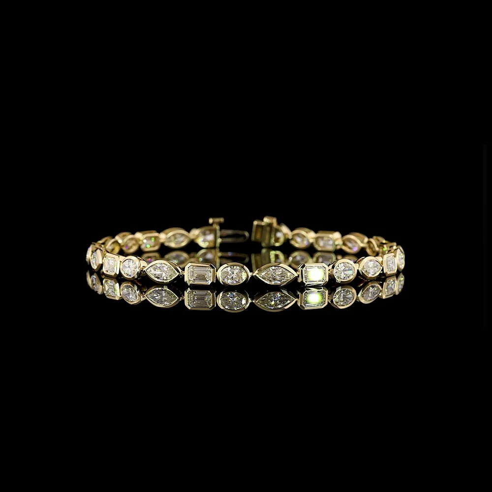 14K Yellow Gold Mixed Shape Tennis Bracelet with Bezel Set Marquise, Emerald, and Oval Lab Diamonds - 6.74 Carat Total Weight - Covaloro Fine Jewelry