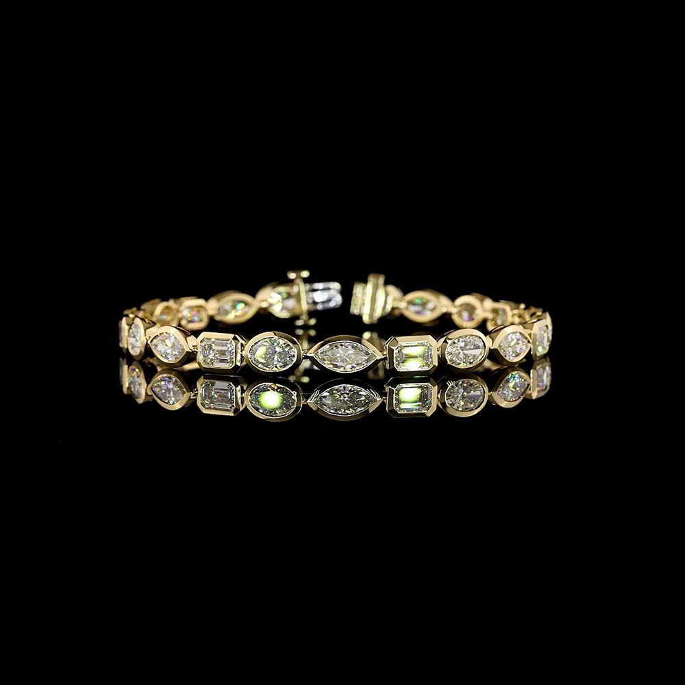 14K Yellow Gold Mixed Shape Tennis Bracelet with Bezel Set Oval, Emerald, and Marquise Lab Diamonds - 12.69 Carat Total Diamond Weight - Covaloro Fine Jewelry