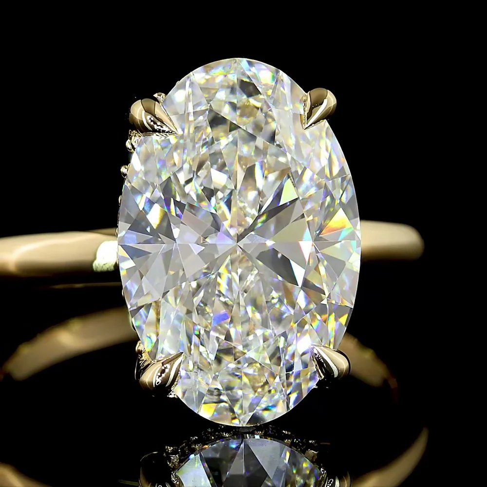 14K Yellow Gold Oval Cut Hidden Halo Ring with 5.13 Carat Lab Diamond Center and 0.19 Carat Brilliant Cut Lab Diamond Accents - IGI E VVS2 Certified - Covaloro Fine Jewelry - Image 2