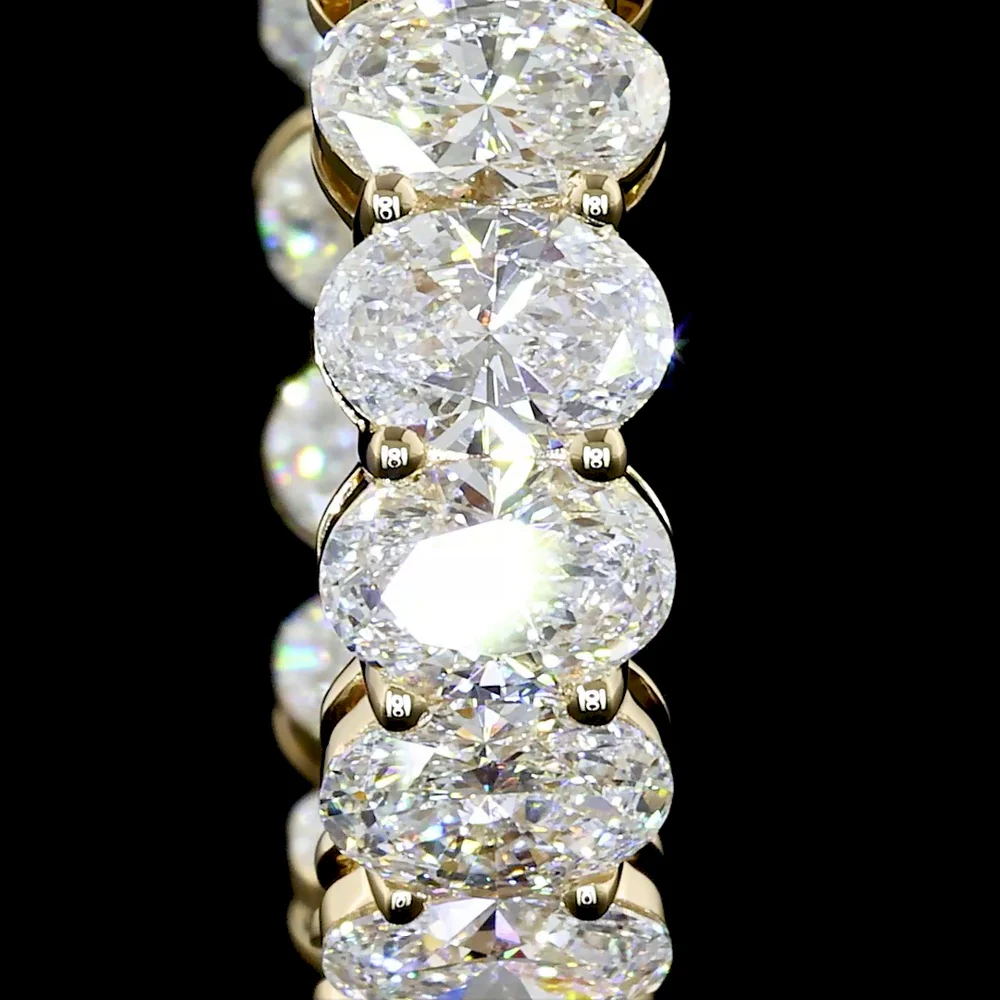 14K Yellow Gold Oval Cut Lab Diamond Huggie Earrings with Prong Settings - 6.61 Carat Total Diamond Weight (E-F Color, VS2 Clarity) - Covaloro Fine Jewelry - Image 3