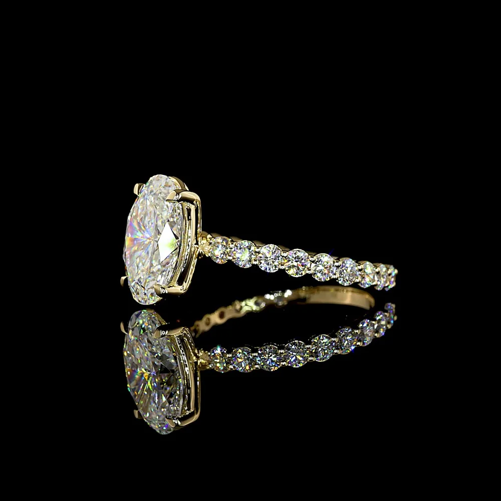 14K Yellow Gold Oval Solitaire Diamond Shank Ring with 3.04 Carat E VVS2 Lab Diamond and 0.89 Carat Brilliant Cut Round Diamond Accents - 3.93 Carat Total Diamond Weight - Covaloro Fine Jewelry - Image 4