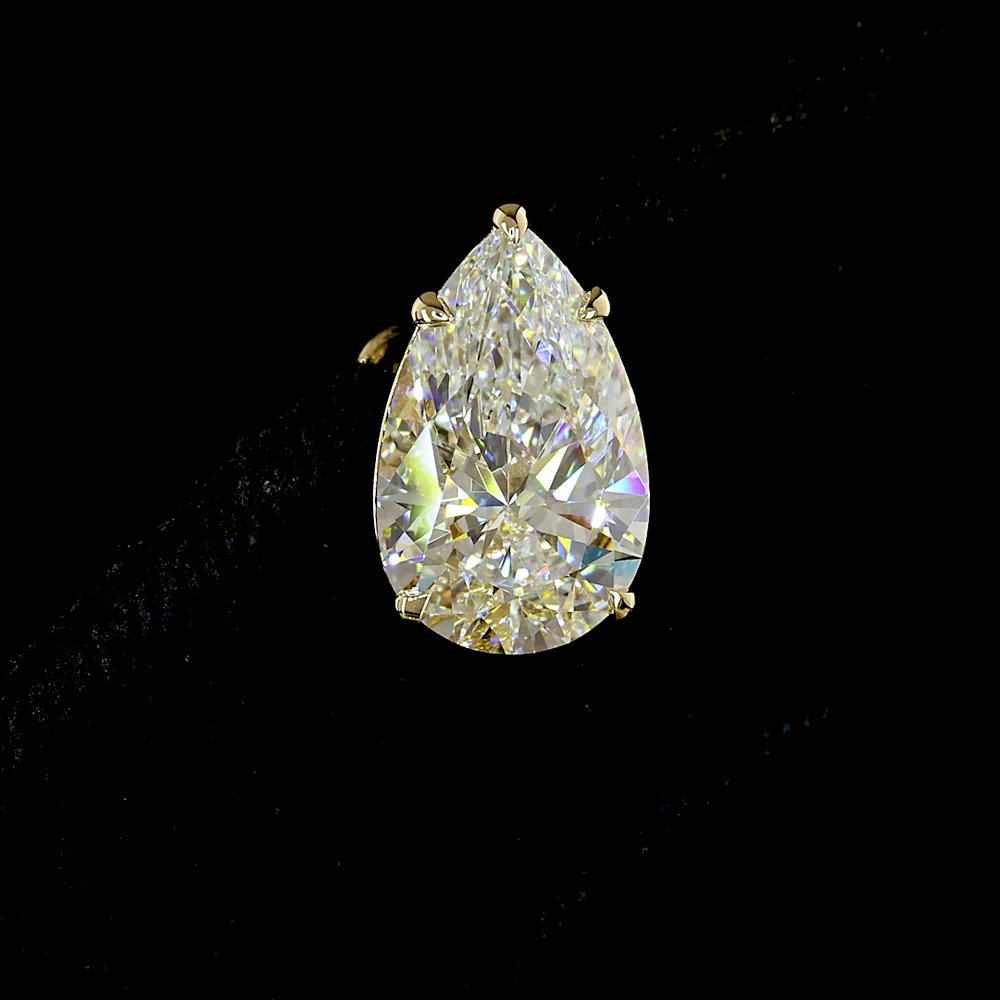 14K Yellow Gold Pear Shape Diamond Stud Earrings with North-South Prong Set Lab Diamonds - 5.04 Carat Total Weight (D-VVS2, IGI Certified) - Covaloro Fine Jewelry - Image 2