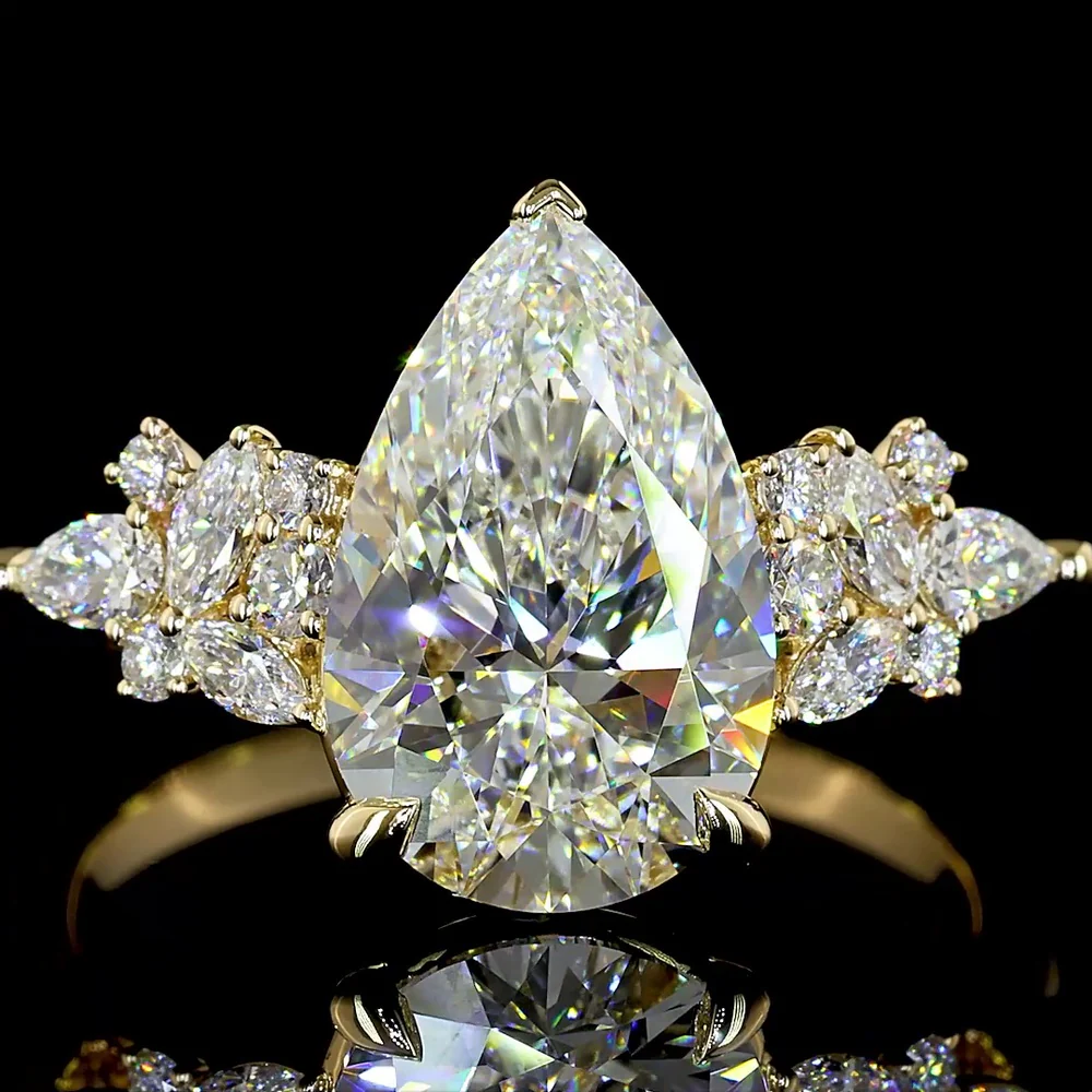 14K Yellow Gold Pear Shape Lab Diamond Ring with Mixed Shape Accents - 3.36 Carat Total Diamond Weight, E VVS2 Center Stone - Covaloro Fine Jewelry - Image 2