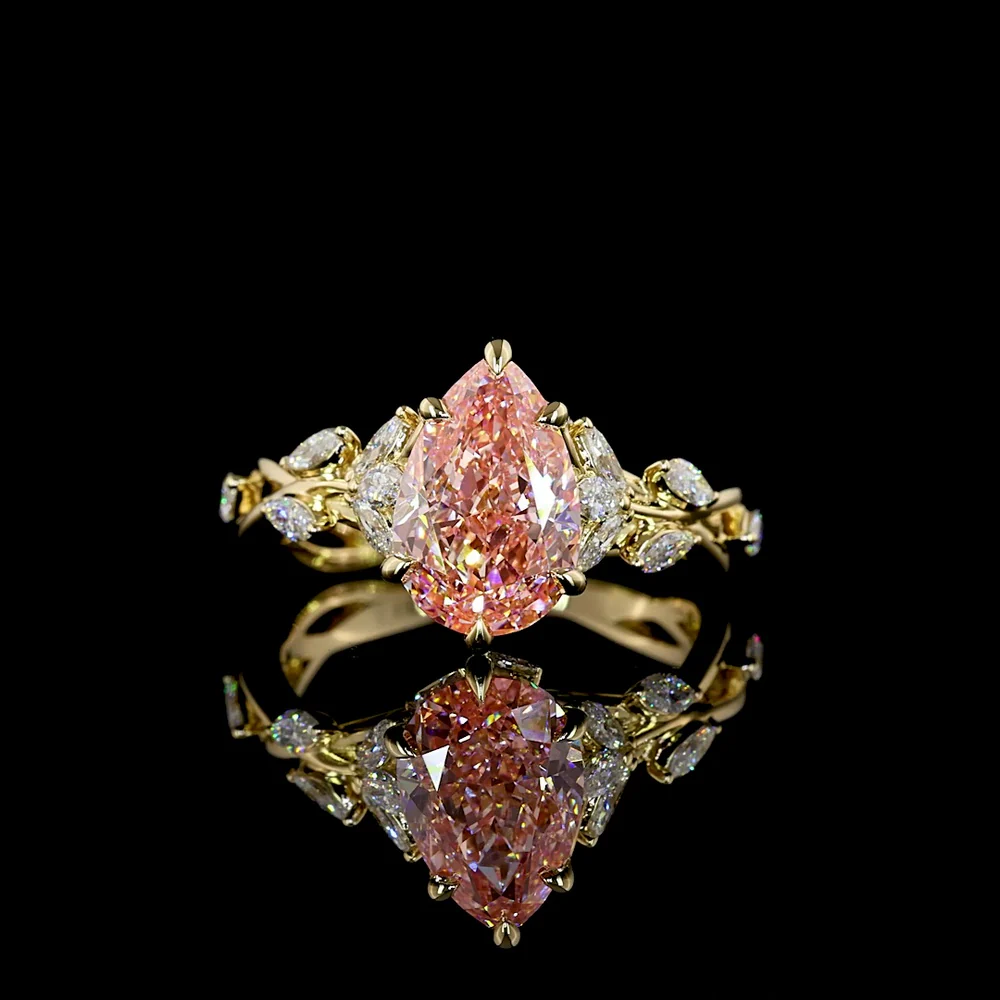 14K Yellow Gold Pear Shape Ring with 2.54 Carat Fancy Vivid Pink Lab Diamond and Marquise Cut White Diamond Accents - 3.12 Total Carat Weight - Covaloro Fine Jewelry