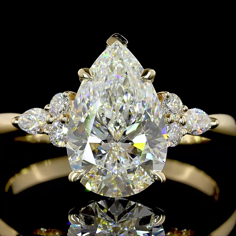14K Yellow Gold Pear Shaped Engagement Ring with 2.51 Carat F VVS2 Lab Diamond Center and Marquise & Round Side Stones - 2.75 Total Carat Weight - Covaloro Fine Jewelry - Image 2