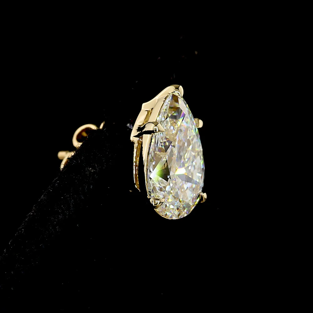 14K Yellow Gold Pear-Shaped Lab Diamond Stud Earrings - D VVS2 Clarity, North-South Prong Set, 4.46 Carat Total Weight (IGI Certified) - Covaloro Fine Jewelry - Image 4
