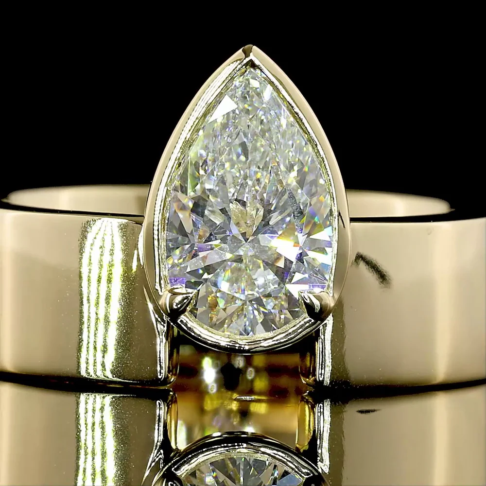 14K Yellow Gold Pear-Shaped Solitaire Ring with Bezel-Prong Set Lab Diamond - 1.33 Carat Total Weight, E-F Color VS1 Clarity - Covaloro Fine Jewelry - Image 2