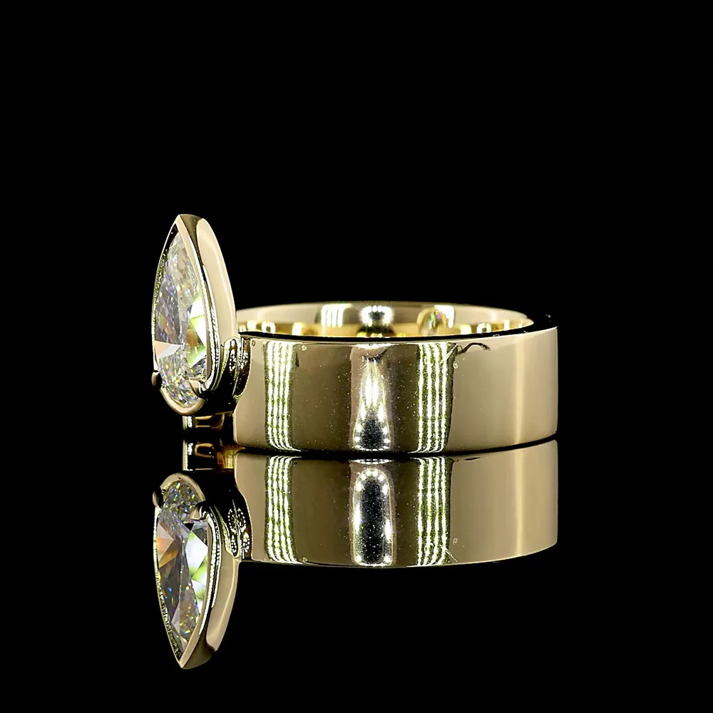 14K Yellow Gold Pear-Shaped Solitaire Ring with Bezel-Prong Set Lab Diamond - 1.33 Carat Total Weight, E-F Color VS1 Clarity - Covaloro Fine Jewelry - Image 4
