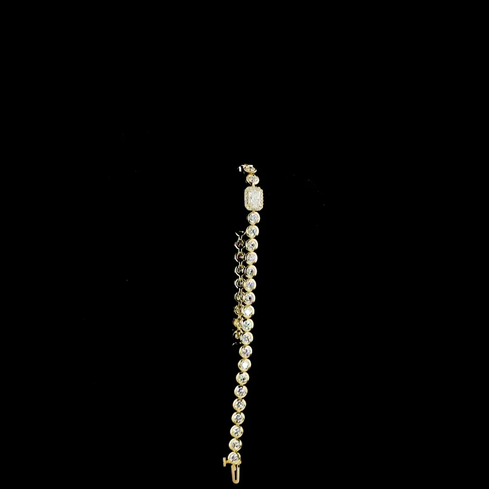 14K Yellow Gold Radiant Cut Tennis Bracelet with East-West Center Diamond and Bezel-Prong Setting - 4.32 Carats Total Lab Diamond Weight - Covaloro Fine Jewelry - Image 3