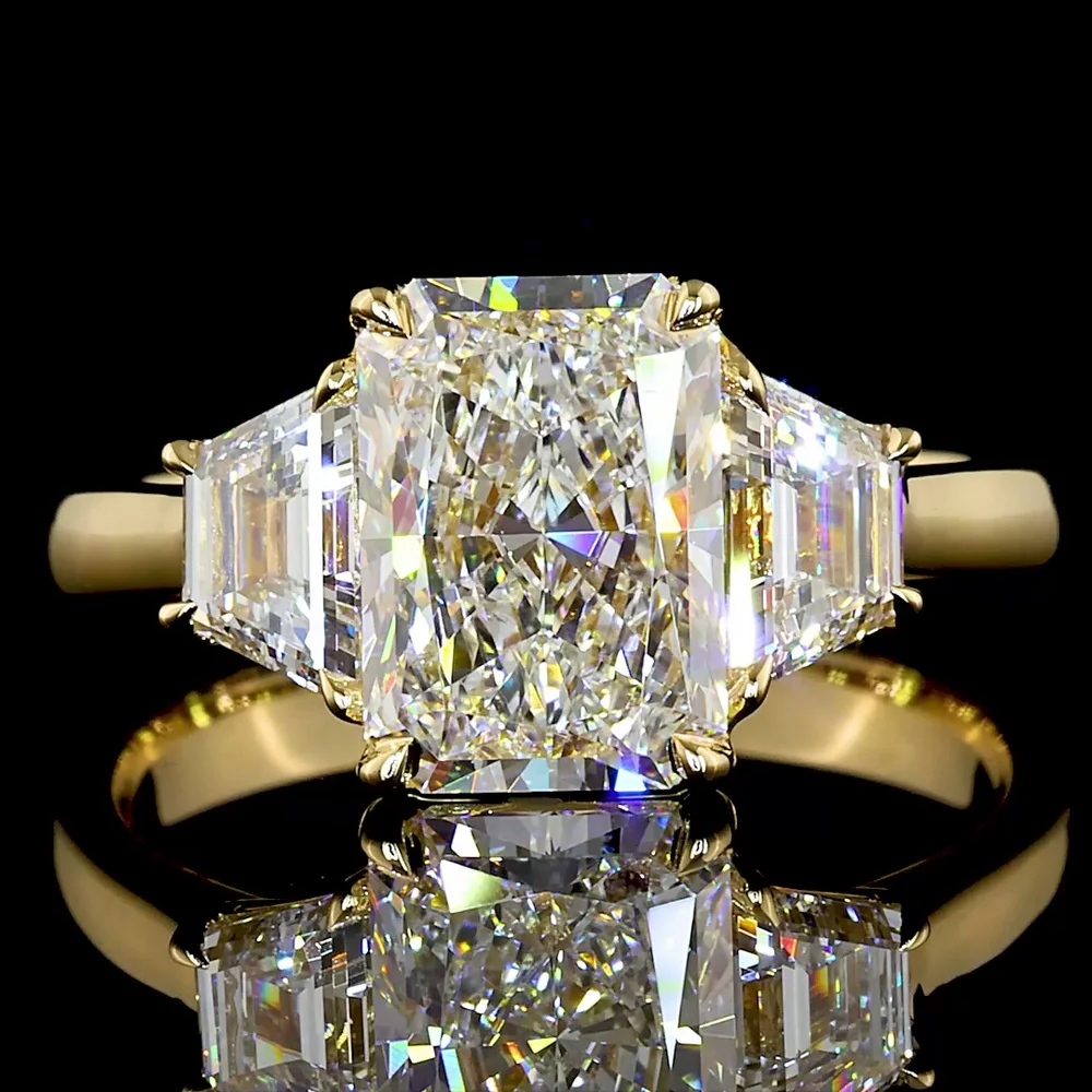 14K Yellow Gold Radiant Cut Three Stone Ring with 1.60 Carats D VVS2 Center Diamond and 0.63 Carats Trapezoid Side Stones - 2.23 Carats Total Diamond Weight - Covaloro Fine Jewelry - Image 2