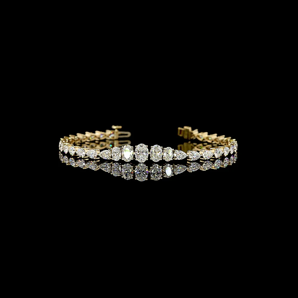 14K Yellow Gold Riviera Bracelet with 33 Graduated Oval Cut Lab Diamonds - 5.86 Carats Total Diamond Weight E-F VS1 - Covaloro Fine Jewelry