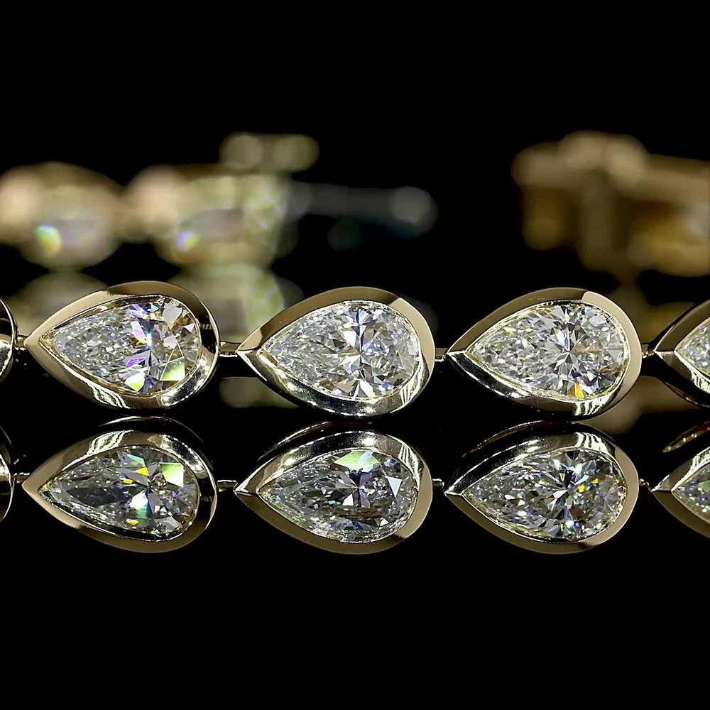 14K Yellow Gold Tennis Bracelet with 29 East-West Bezel Set Pear Shape Lab Grown Diamonds - 4.59 Carat Total Weight - Covaloro Fine Jewelry - Image 2