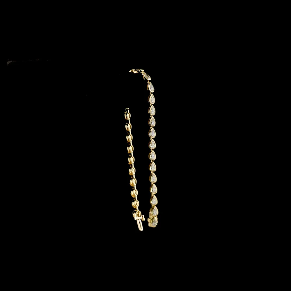 14K Yellow Gold Tennis Bracelet with 29 East-West Bezel Set Pear Shape Lab Grown Diamonds - 4.59 Carat Total Weight - Covaloro Fine Jewelry - Image 3