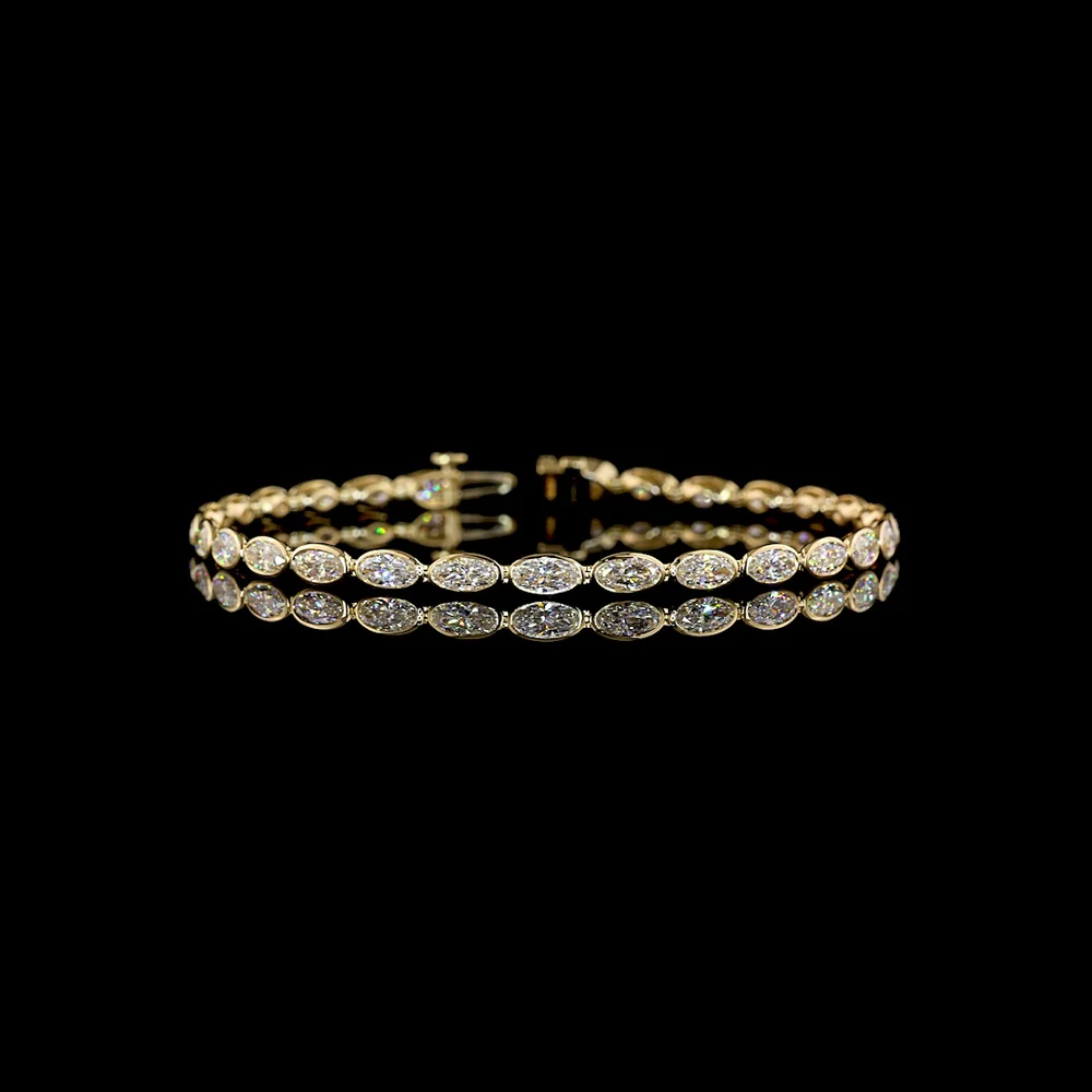14K Yellow Gold Tennis Bracelet with East-West Bezel Set Moval Cut Lab Diamonds - 4.70 Carat Total Diamond Weight - Covaloro Fine Jewelry