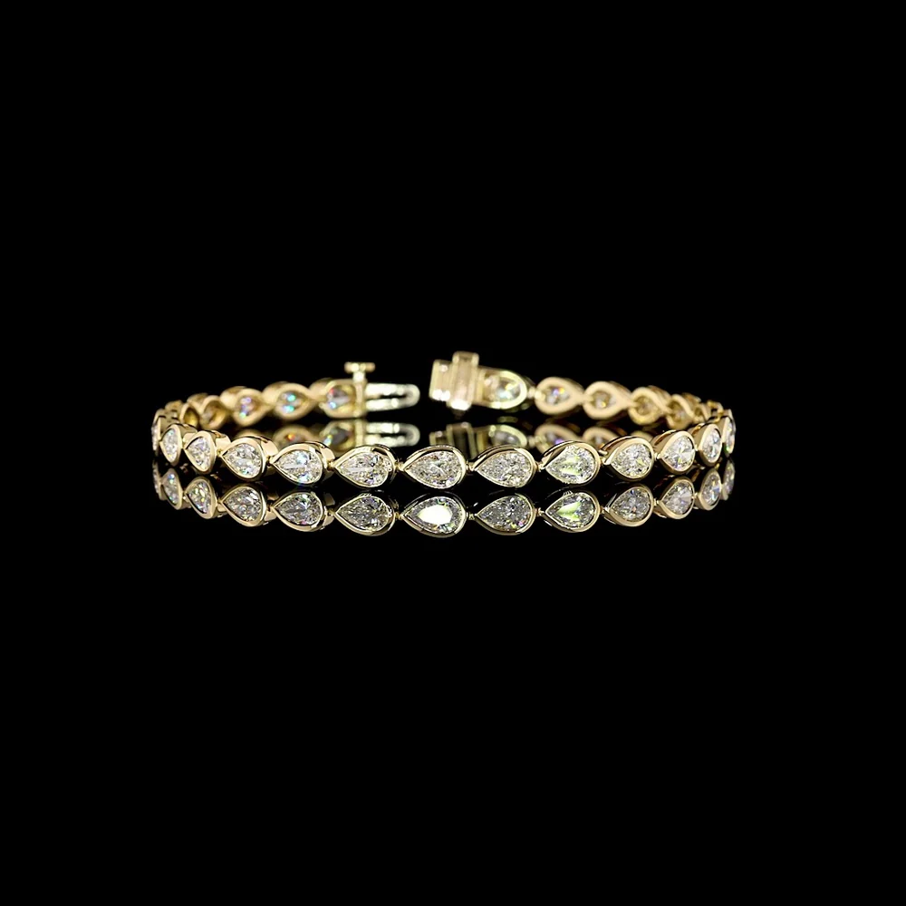 14K Yellow Gold Tennis Bracelet with East-West Bezel Set Pear Shape Lab Diamonds - 5.91 Carat Total Diamond Weight, E-F Color VS Clarity - Covaloro Fine Jewelry