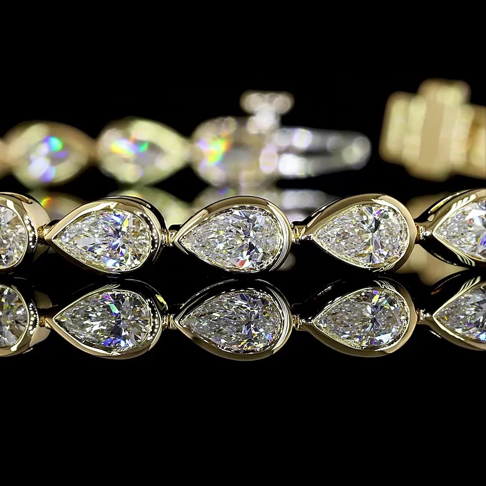 14K Yellow Gold Tennis Bracelet with East-West Bezel Set Pear Shape Lab Diamonds - 5.91 Carat Total Diamond Weight, E-F Color VS Clarity - Covaloro Fine Jewelry - Image 2