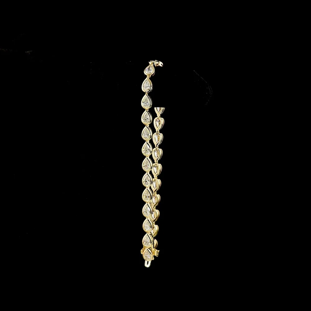 14K Yellow Gold Tennis Bracelet with East-West Bezel Set Pear Shape Lab Diamonds - 5.91 Carat Total Diamond Weight, E-F Color VS Clarity - Covaloro Fine Jewelry - Image 3