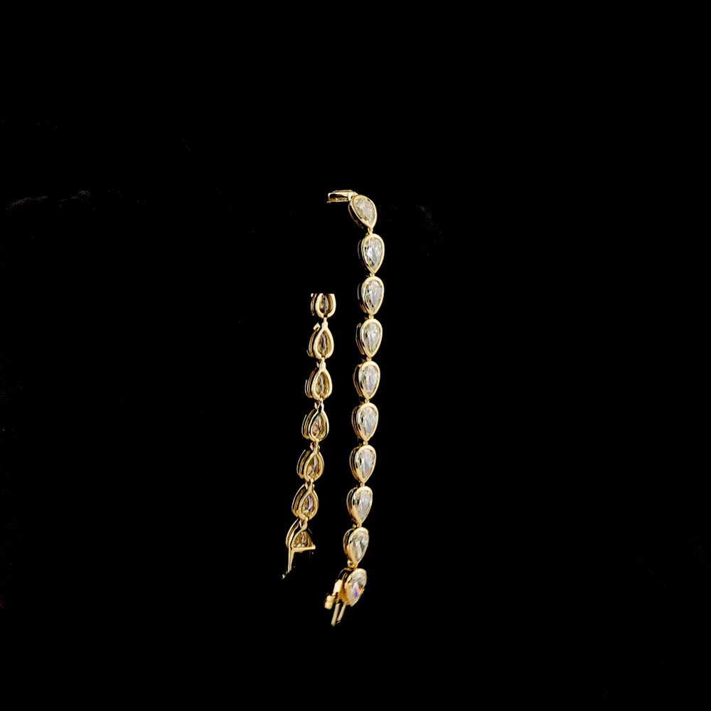 14K Yellow Gold Tennis Bracelet with East-West Bezel Set Pear Shaped Lab Diamonds - 10.98 Carat Total Weight (21 Stones, E-F Color, VS1 Clarity) - Covaloro Fine Jewelry - Image 3