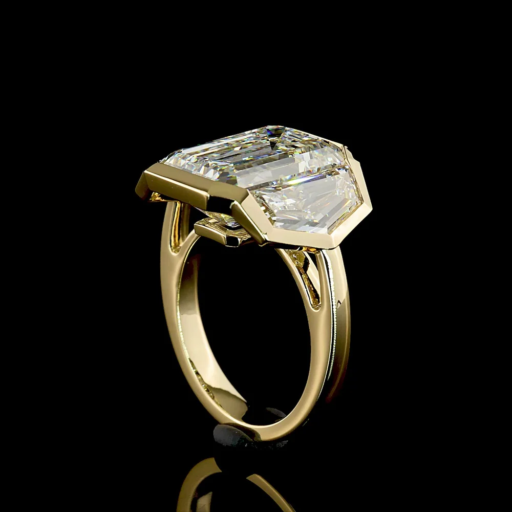 14K Yellow Gold Three-Stone Bezel Set Ring with Emerald Cut Lab Diamonds - 9.08 Carats Center, 12.22 Carats Total Diamond Weight - Covaloro Fine Jewelry - Image 3