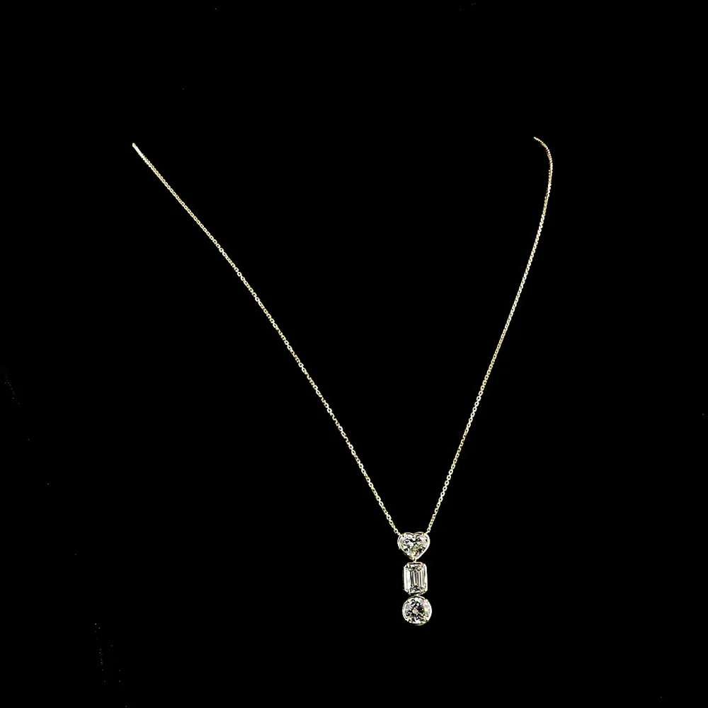 14K Yellow Gold Three-Stone North-South Pendant with Heart, Emerald Cut, and Round Lab Diamonds - 3.03 Total Carat Weight - Covaloro Fine Jewelry - Image 4