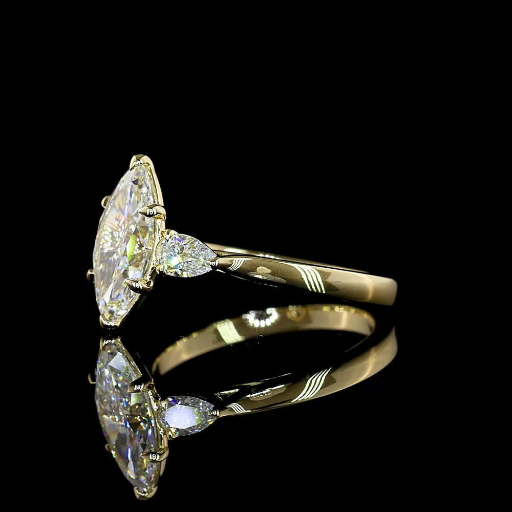 14K Yellow Gold Three-Stone Ring with 1.53 Carat Marquise Cut Lab Diamond and Pear Shape Side Stones - 1.8 Carat Total Diamond Weight - Covaloro Fine Jewelry - Image 3
