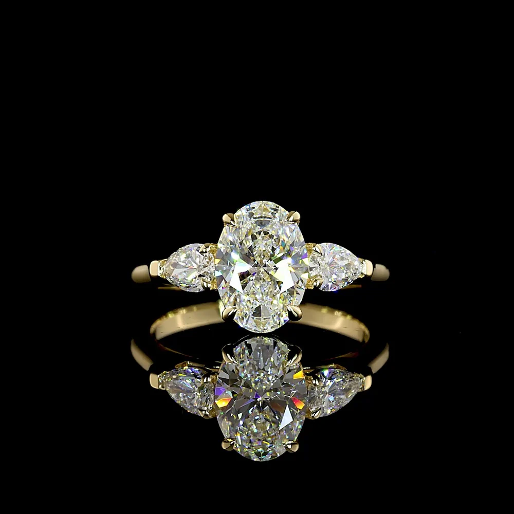 14K Yellow Gold Three Stone Ring with 1.56 Carat Oval Cut Lab Diamond (D VVS2) and 0.49 Carat Pear Shaped Lab Diamonds - 2.05 Carat Total Diamond Weight - Covaloro Fine Jewelry