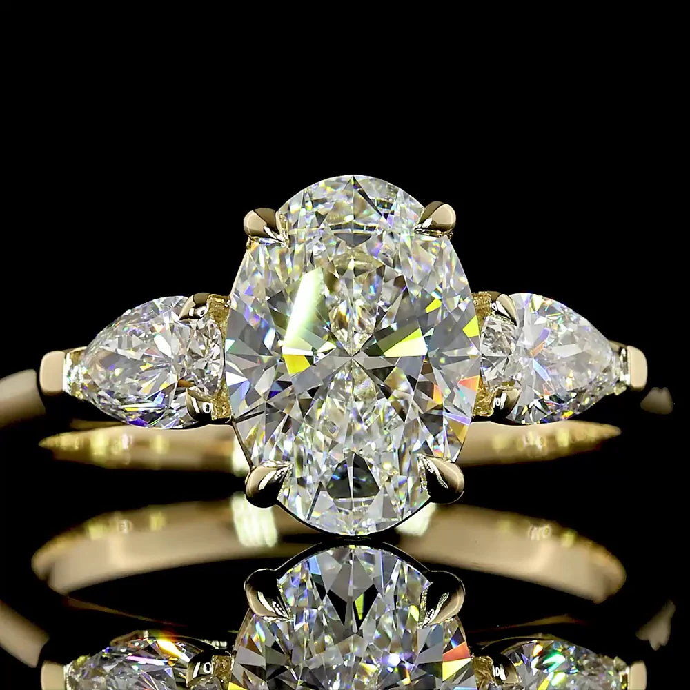 14K Yellow Gold Three Stone Ring with 1.56 Carat Oval Cut Lab Diamond (D VVS2) and 0.49 Carat Pear Shaped Lab Diamonds - 2.05 Carat Total Diamond Weight - Covaloro Fine Jewelry - Image 2