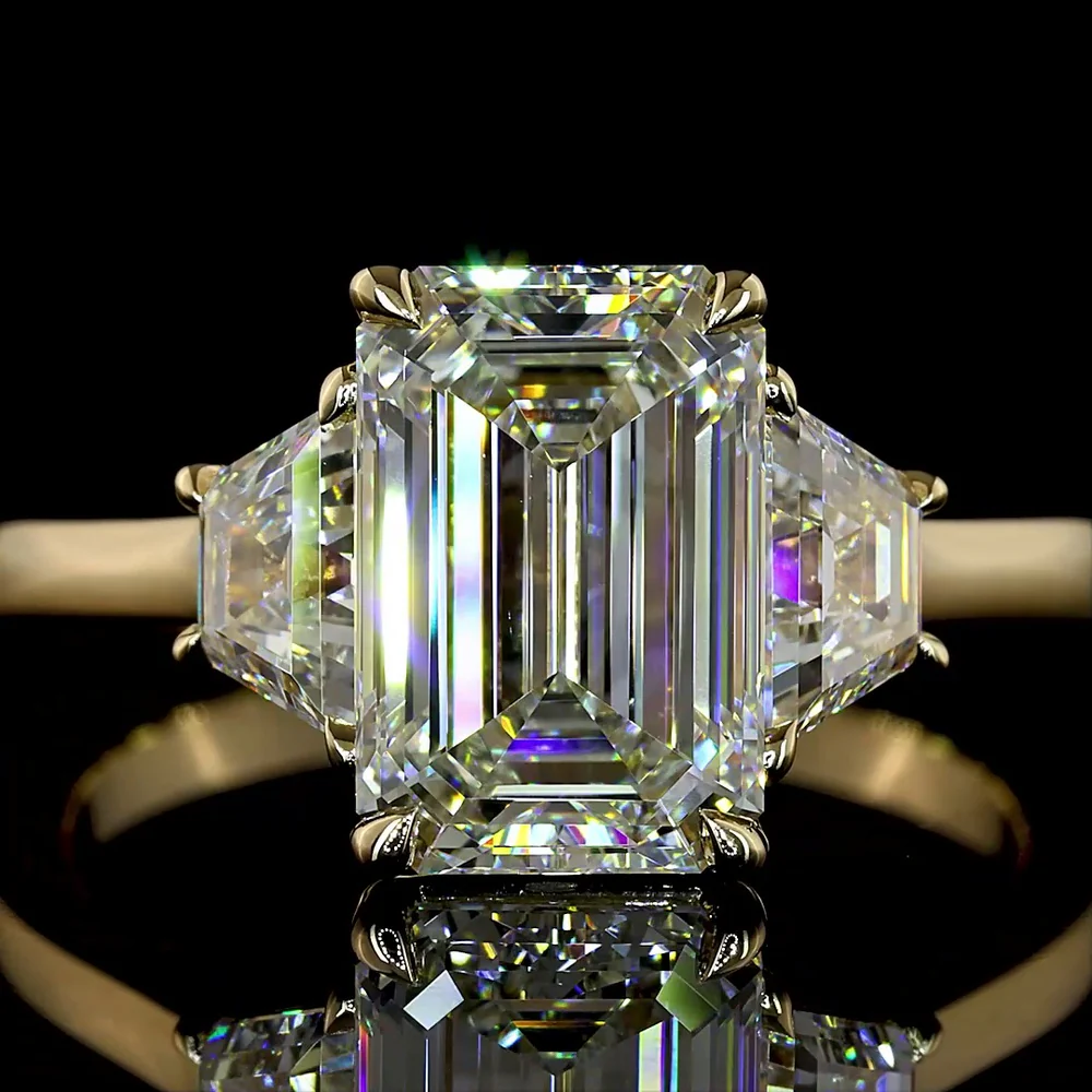 14K Yellow Gold Three Stone Ring with 2.69 Carat Emerald Cut Lab Diamond and 0.79 Carat Trapezoid Side Stones - 3.48 Carat Total Diamond Weight - Covaloro Fine Jewelry - Image 2