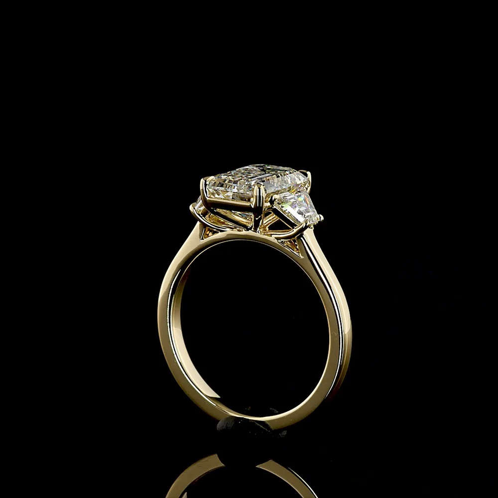 14K Yellow Gold Three Stone Ring with 2.69 Carat Emerald Cut Lab Diamond and 0.79 Carat Trapezoid Side Stones - 3.48 Carat Total Diamond Weight - Covaloro Fine Jewelry - Image 3