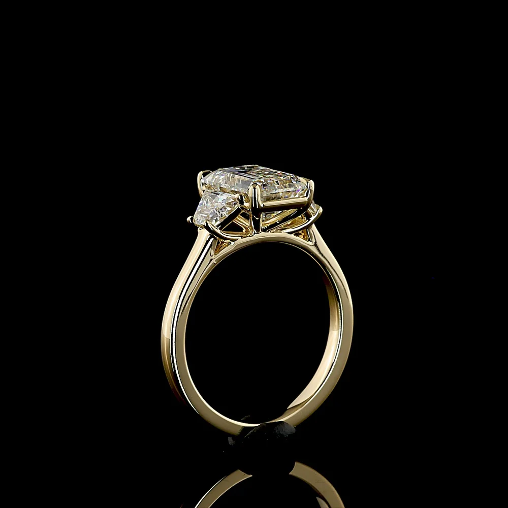 14K Yellow Gold Three Stone Ring with 2.69 Carat Emerald Cut Lab Diamond and 0.79 Carat Trapezoid Side Stones - 3.48 Carat Total Diamond Weight - Covaloro Fine Jewelry - Image 4