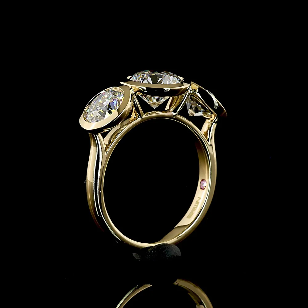 14K Yellow Gold Three Stone Ring with Bezel Set Round Brilliant Cut Lab Diamonds - 4.01 Carat Total Diamond Weight (1.91 Carat Center D VVS2) - Covaloro Fine Jewelry - Image 4