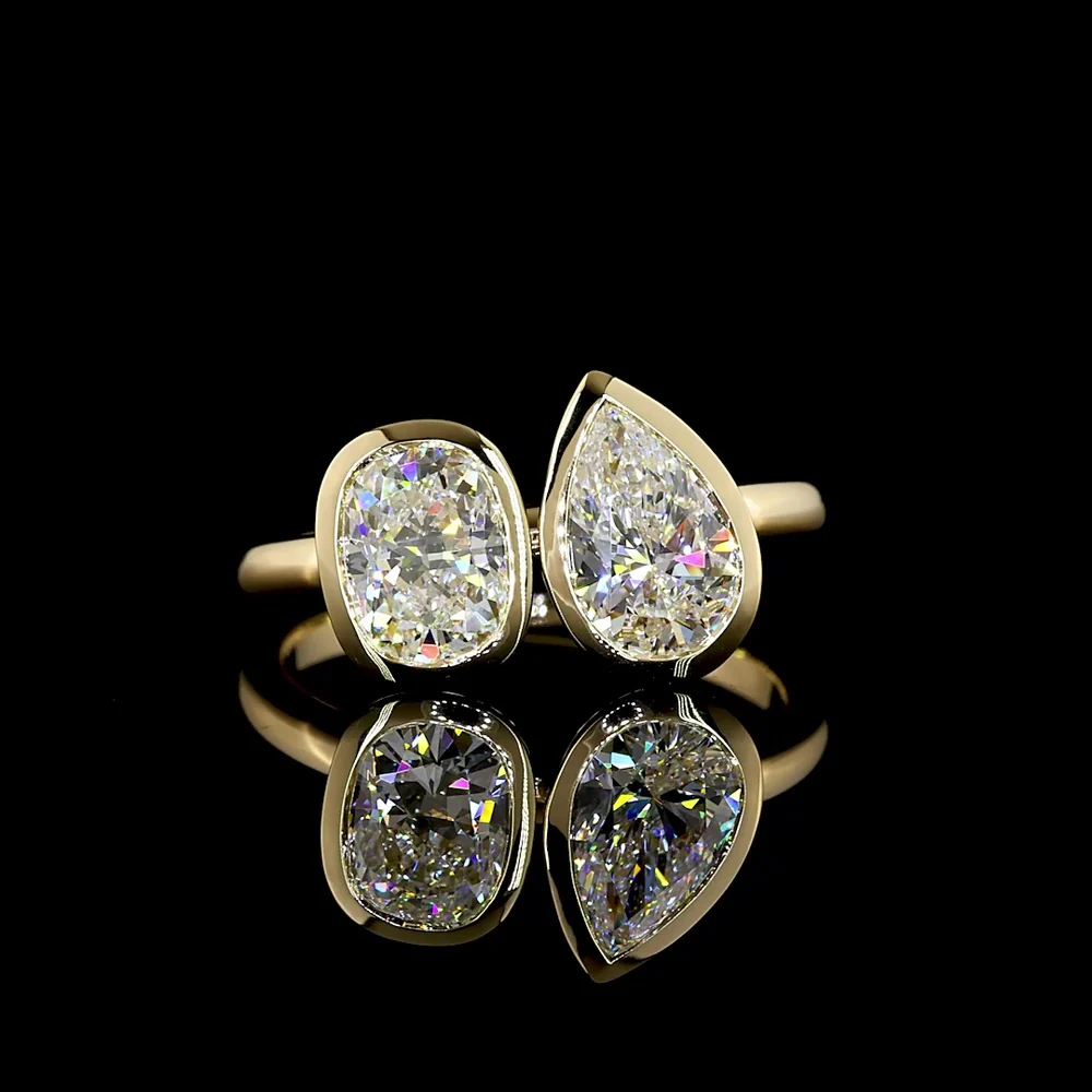 14K Yellow Gold Toi et Moi Ring with 2.03 Carats Lab Grown Pear and Cushion Cut Diamonds in Bezel Setting - E VS1 Clarity - Covaloro Fine Jewelry