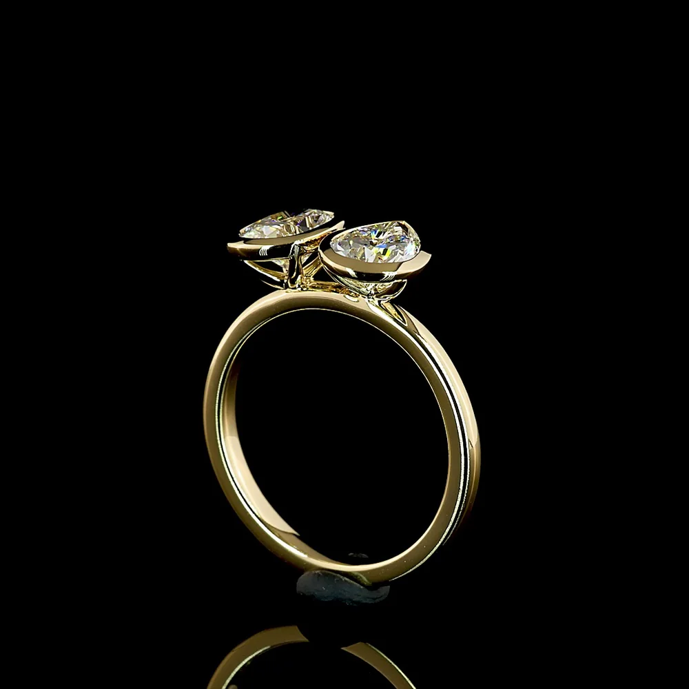 14K Yellow Gold Toi et Moi Ring with 2.03 Carats Lab Grown Pear and Cushion Cut Diamonds in Bezel Setting - E VS1 Clarity - Covaloro Fine Jewelry - Image 3