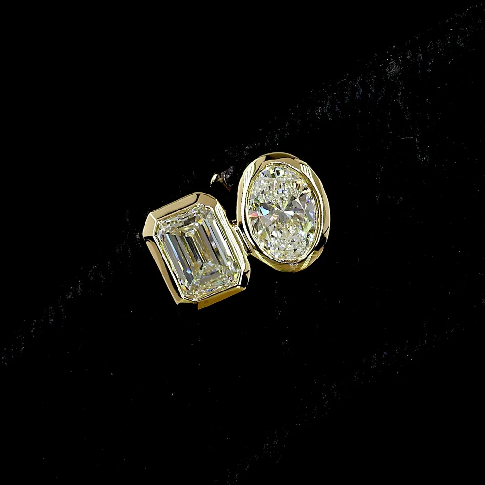 14K Yellow Gold Toi et Moi Stud Earrings with Bezel Set Emerald Cut and Oval Cut Lab Diamonds - 1.92 Carat Total Diamond Weight - Covaloro Fine Jewelry - Image 2