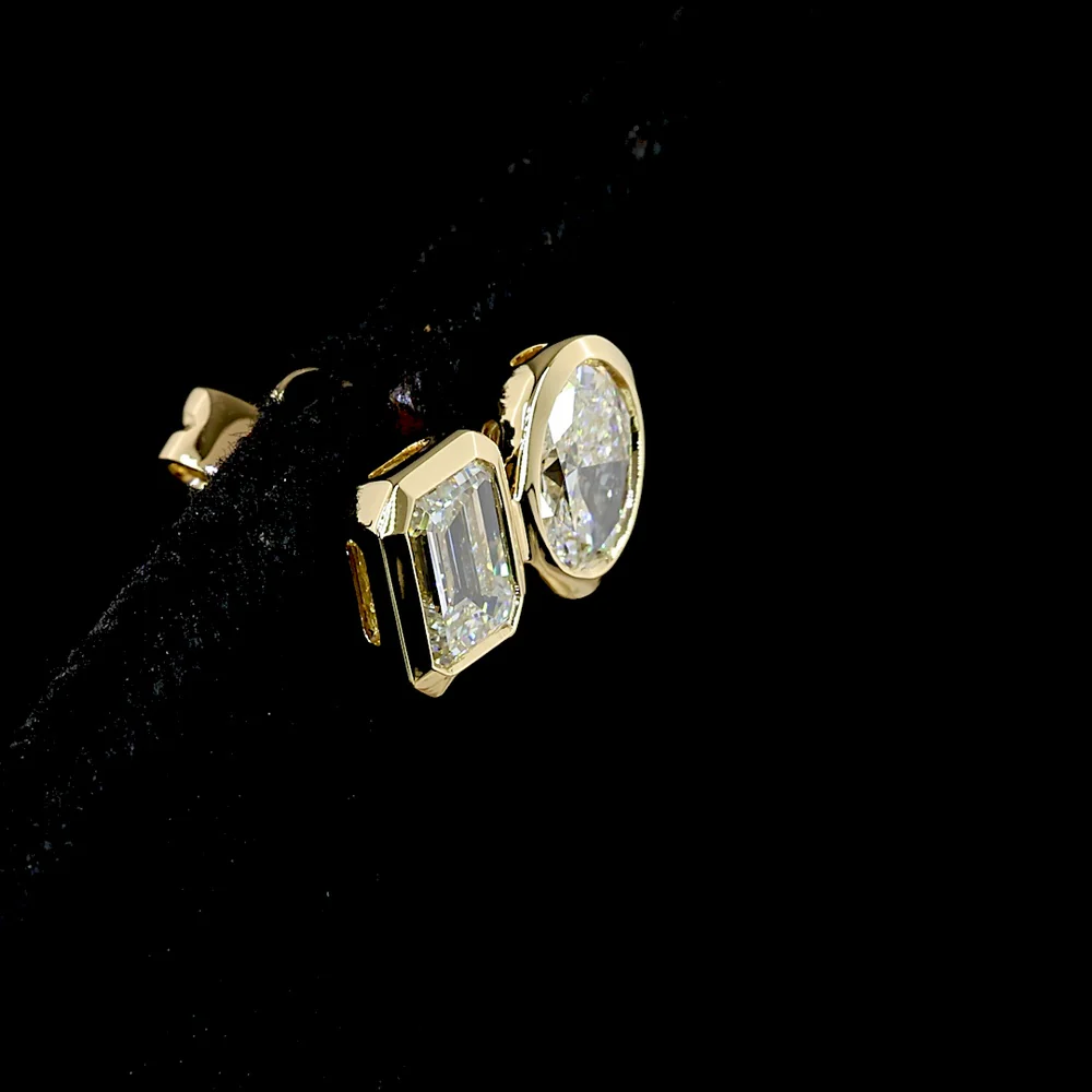 14K Yellow Gold Toi et Moi Stud Earrings with Bezel Set Emerald Cut and Oval Cut Lab Diamonds - 1.92 Carat Total Diamond Weight - Covaloro Fine Jewelry - Image 4